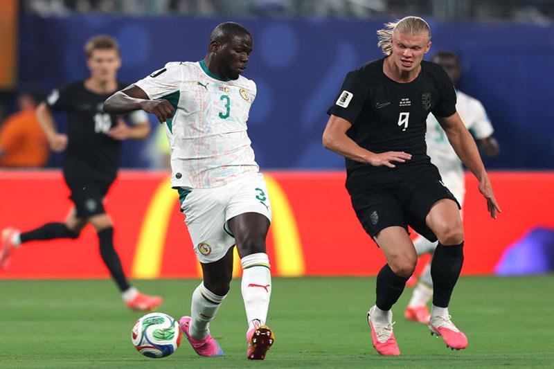 Erling Haaland celebrating goal during Norway vs Senegal World Cup match in New Jersey stadium