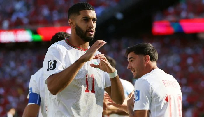 Morocco players celebrate after scoring against Scotland in the FIFA World Cup match