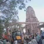 Emergency teams clearing debris after a temple roof collapse in Prabhani, Maharashtra, India.