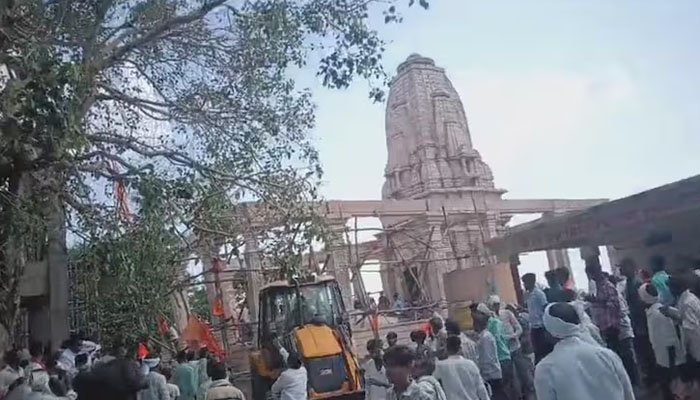 Emergency teams clearing debris after a temple roof collapse in Prabhani, Maharashtra, India.