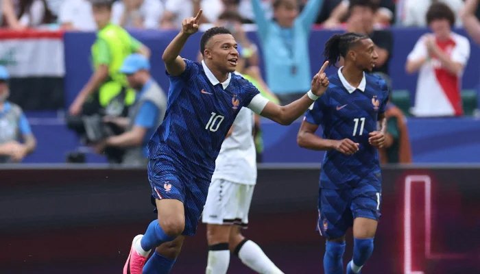 Kylian Mbappe celebrating goal during France vs Iraq FIFA World Cup match in Philadelphia stadium