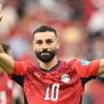 Mohamed Salah scoring a goal for Egypt during FIFA World Cup match against New Zealand in Vancouver.