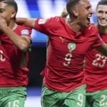 Morocco football team celebrating a goal during their FIFA World Cup 2026 match against Haiti in Atlanta.