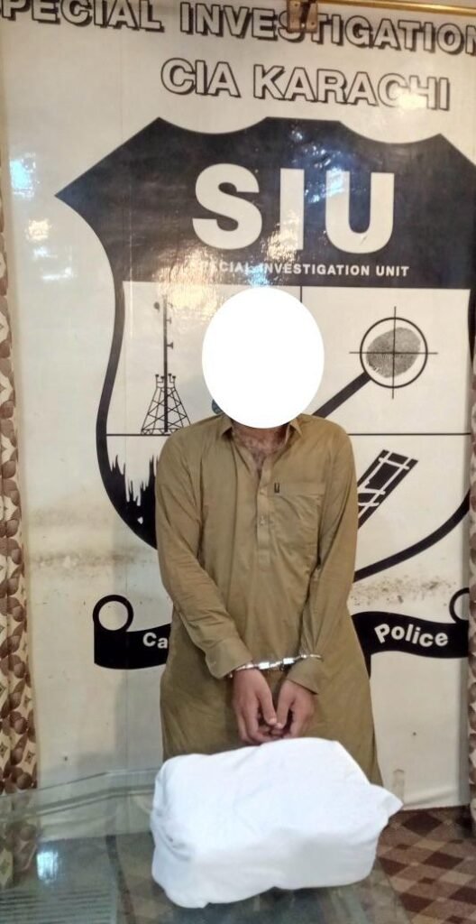 Recovered hashish displayed after a Special Investigation Unit operation in Karachi's Steel Town area.