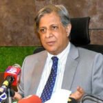 Federal Law Minister Azam Nazeer Tarar speaking at a lawyers' event in Lahore.