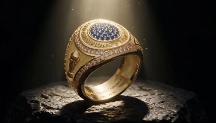 The FIFA World Cup trophy displayed alongside the newly introduced championship rings for the 2026 tournament winners.