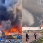 Black smoke billows over Russia's Tambov region following a reported Ukrainian drone attack targeting a logistics facility.