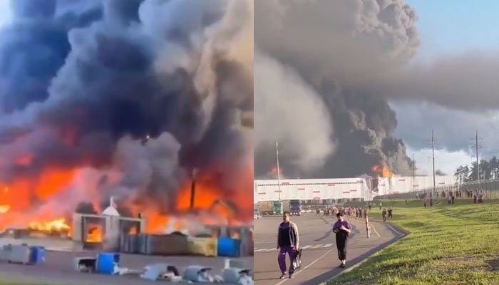 Black smoke billows over Russia's Tambov region following a reported Ukrainian drone attack targeting a logistics facility.