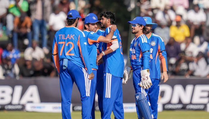 Indian cricket team celebrates after reclaiming the No. 1 position in the ICC T20I team rankings.