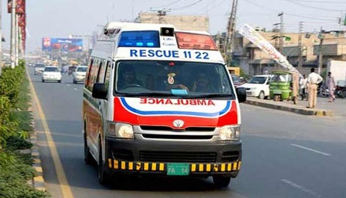 Emergency responders assisting injured passengers after a bus accident on Swat Expressway near Chakdara.