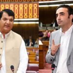 Federal Minister for Kashmir Affairs Amir Muqam speaking at a political rally in Muzaffarabad.