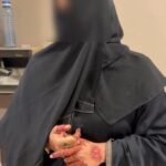 FIA immigration officials conduct checks at Karachi airport during a human trafficking investigation.