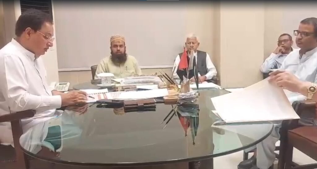 Provincial Minister Jam Ikramullah Dharejo chairs a meeting to review PSDP road projects in SITE Karachi.