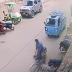 A CCTV image shows a suspect stealing a motorcycle on Jahangirabad Main Road in Karachi's Rizvia area.