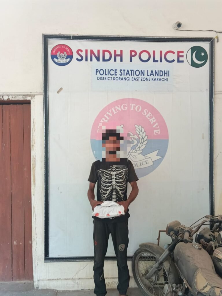 Landhi Police display seized gutka and mawa after arresting a suspect in Karachi.
