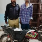 Brigade Police officers with seized illegal weapons, liquor, gutka packets and a recovered stolen motorcycle after operations in Karachi.