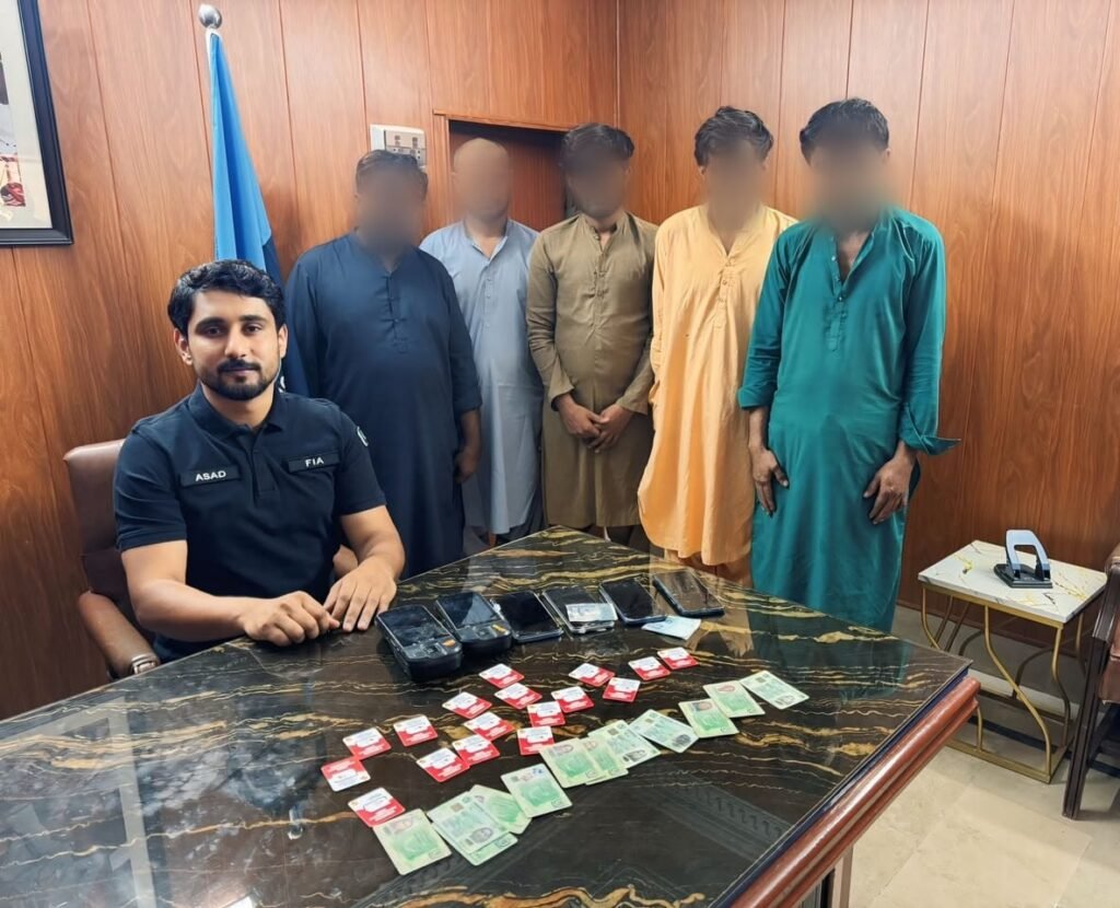FIA officials conducting an operation against suspects accused of BISP fraud in Shaheed Benazirabad.