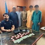 FIA officials conducting an operation against suspects accused of BISP fraud in Shaheed Benazirabad.