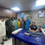FIA officials during an operation against an alleged corruption network at the Regional Passport Office in Malir, Karachi