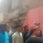 KMC anti-encroachment teams clearing illegal structures along a main road in Gulistan-e-Jauhar, Karachi.