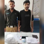 East District Police officials with seized narcotics after arresting a suspected drug trafficker in Karachi's Jamshed Quarters.