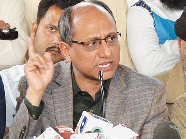 Sindh Minister Saeed Ghani speaks at a press conference about new provinces and Sindh's development projects in Karachi.