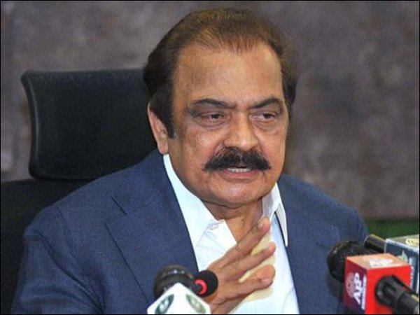 PML-N leader Rana Sanaullah speaks during a press conference on Azad Kashmir election results alongside Amir Muqam.