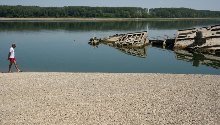 Drought exposes Nazi-era warships in the Danube River during extreme European heat.