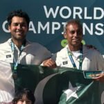 Pakistani tennis player Aisam-ul-Haq with the ITF Masters World Championship mixed doubles title