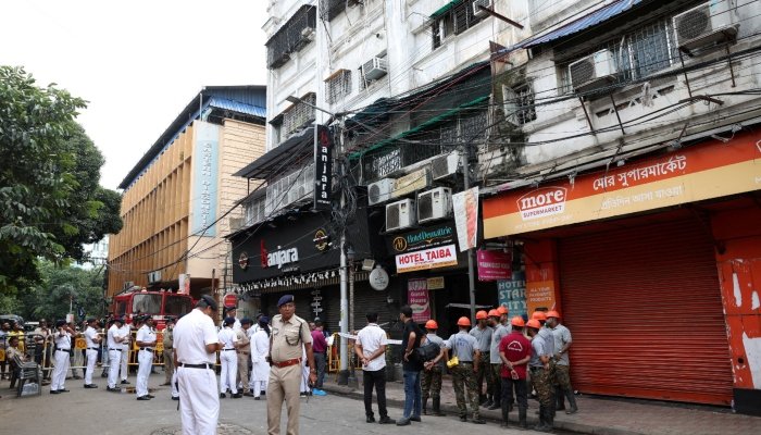 Firefighters respond to a deadly hotel fire in Kolkata, India
