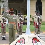 tan Army officers and soldiers attend Independence Day flag-hoisting ceremony in Pakistan