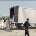 Customs officials inspect non-custom-paid iPhones, laptops and smartwatches in Jacobabad