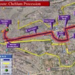 Traffic police personnel manage road closures and traffic arrangements for the Chehlum procession in Karachi.