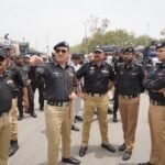 Additional IG Karachi Azad Khan inspecting Chehlum procession security and traffic arrangements.