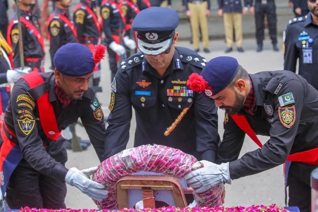 DIG Security Dr. Maqsood Ahmed honors Sindh Police martyrs on Police Martyrs Day.