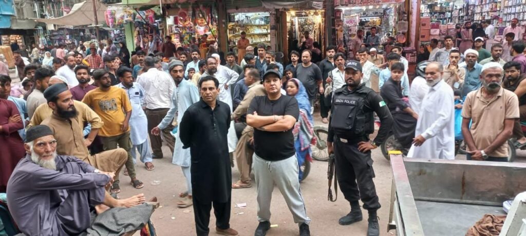 Authorities remove illegal encroachments during a crackdown at Bolton Market in Karachi.