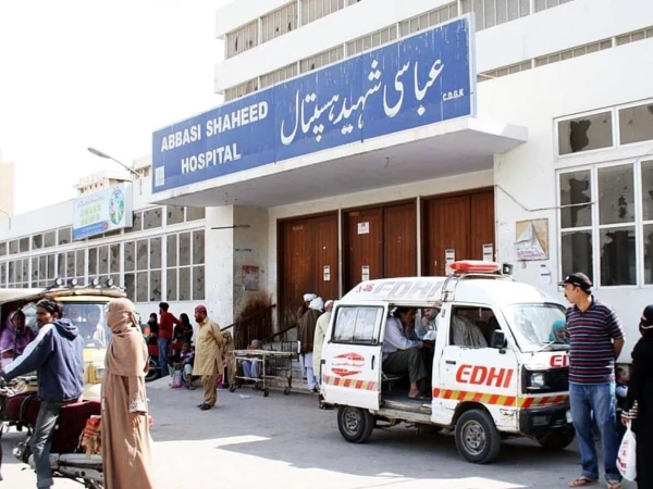 Doctors and medical staff at Abbasi Shaheed Hospital after the reopening of the pediatric ward in Karachi.