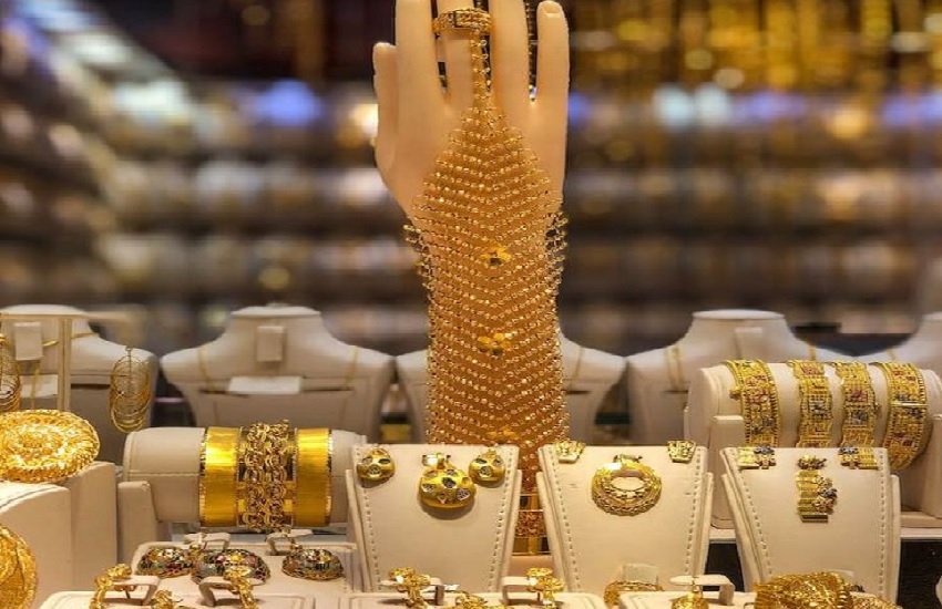 Gold bars and coins representing a sharp decline in gold prices