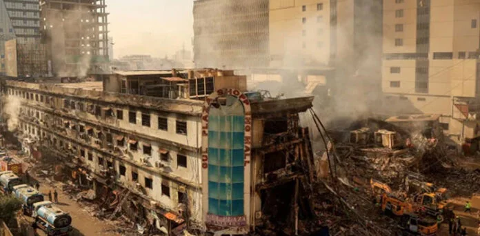 Two Civil Defence officers dismissed in connection with the Gul Plaza fire case in Karachi.
