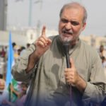 Hafiz Naeem ur Rehman speaks to supporters during a Jamaat-e-Islami protest in Lahore