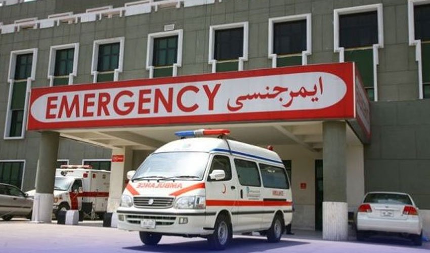 Injured schoolgirls receiving medical assistance after ceiling plaster fell at a government school in Sukkur.