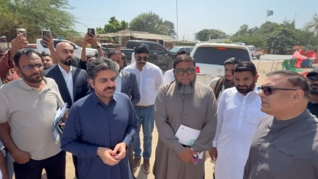 Nasser Hussain Shah inspects the under-construction road in Malir Memon Goth Karachi