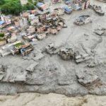 Rescue teams conducting operations after a glacier flood in Nepal