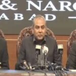 Interior Minister Mohsin Naqvi addresses a press conference about the Islamabad march