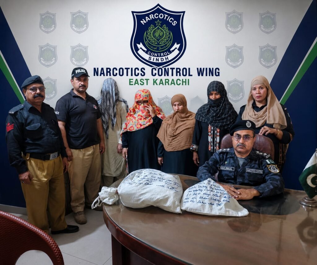 Narcotics officials display recovered ice during a drug crackdown in Karachi.