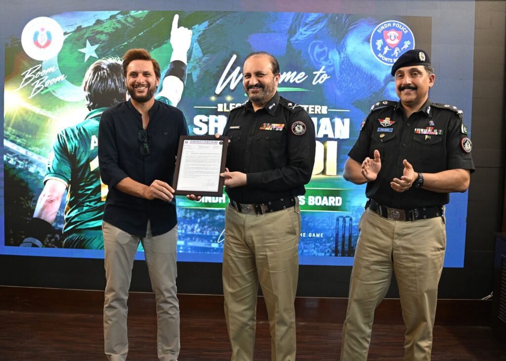 Pakistani cricket legend Shahid Afridi receives his appointment certificate as Sports Ambassador of the Sindh Police Sports Board.