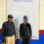 Pakistan Bazaar Police officers after arresting a wanted street criminal in Karachi