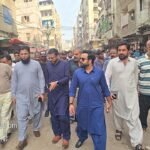 Anti-encroachment operation removing illegal structures and barriers in Saddar Town Karachi.