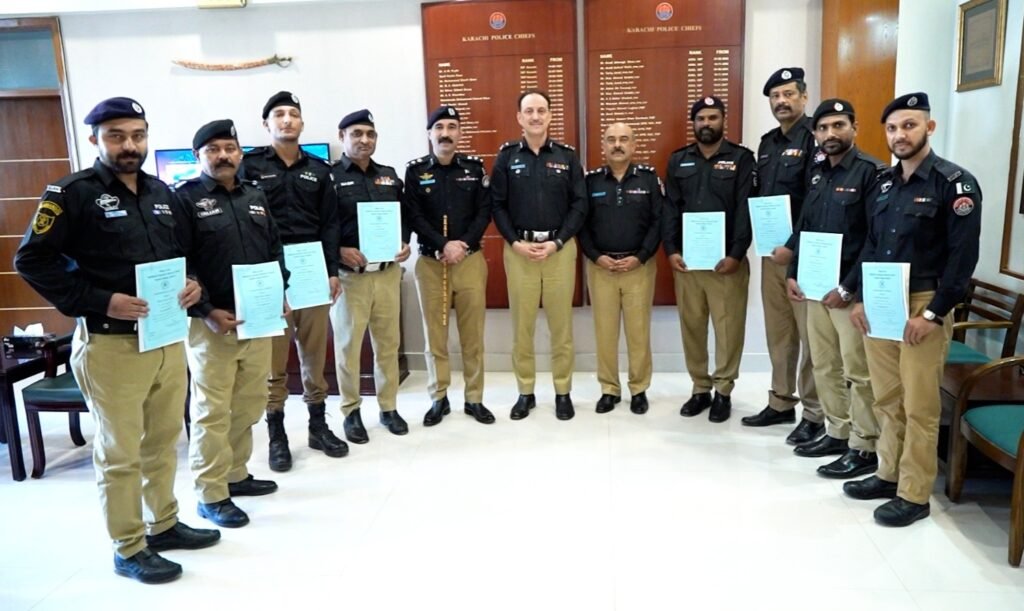 Karachi police officers receiving awards for Surjani Town murder case