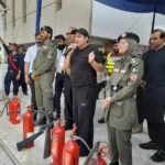 Fire tenders and ambulances participating in a fire safety drill in Saddar Karachi.